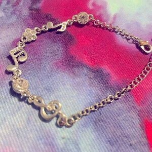 Musical silver tone bracelet for women